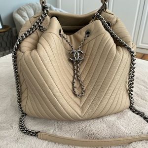 Chanel beige chevron bucket bag crossbody